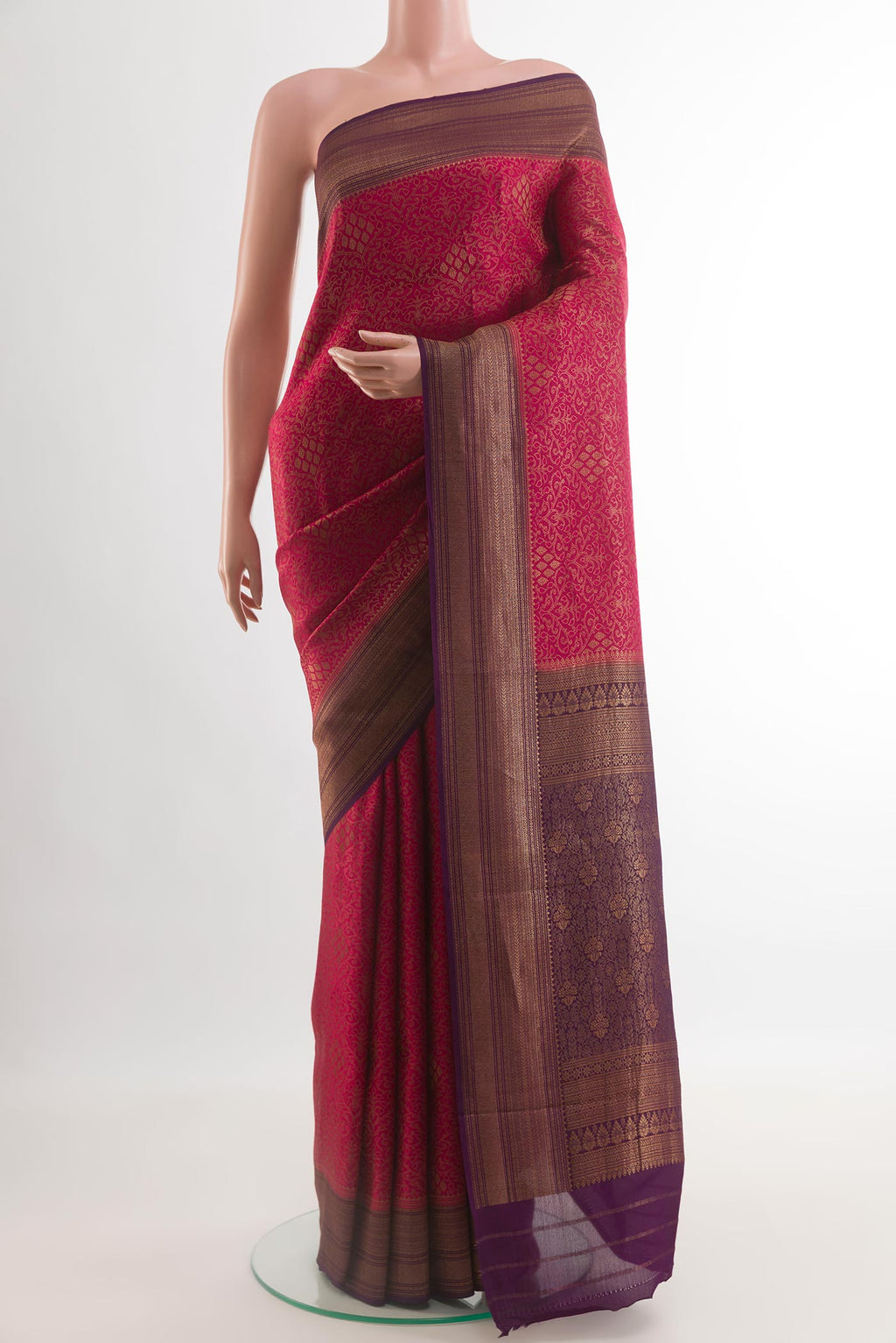 Pink Mysore Crepe Saree with Zari Brocade on the body and Zari Border.  displayed on a mannequin