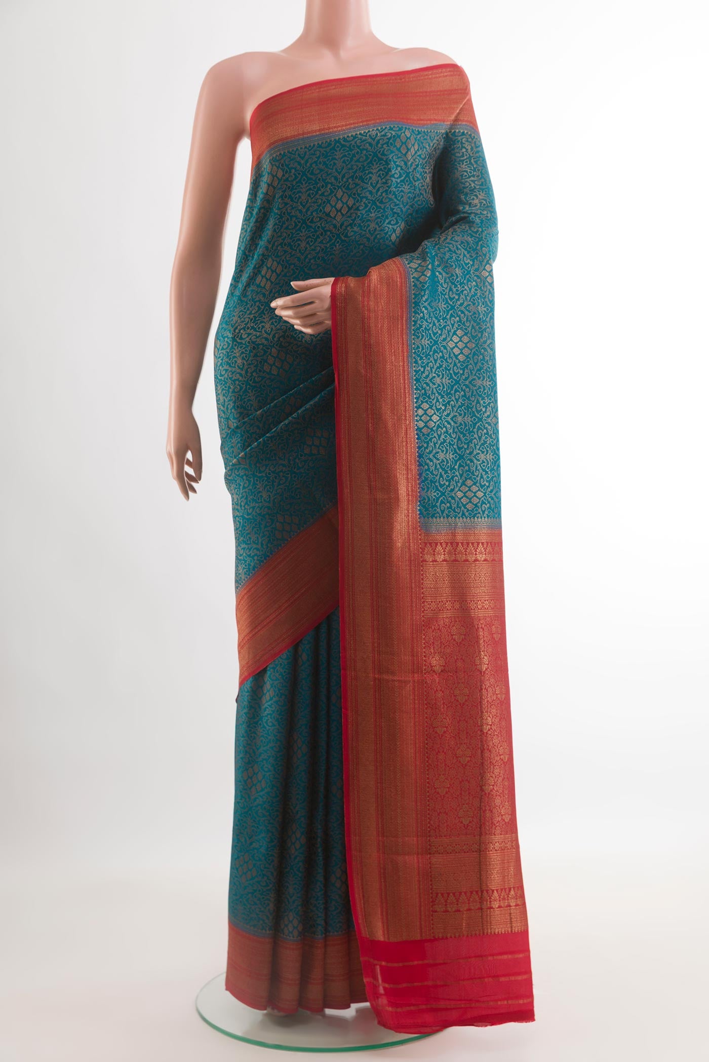 Blue Mysore Crepe Saree with Zari Brocade on the body and Zari Border.  displayed on a mannequin