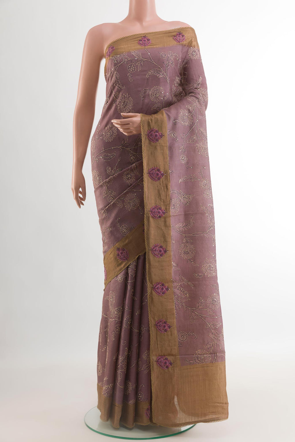 Purple Tussar Silk Saree with Embroidery on the body and Zari Border.  displayed on a mannequin