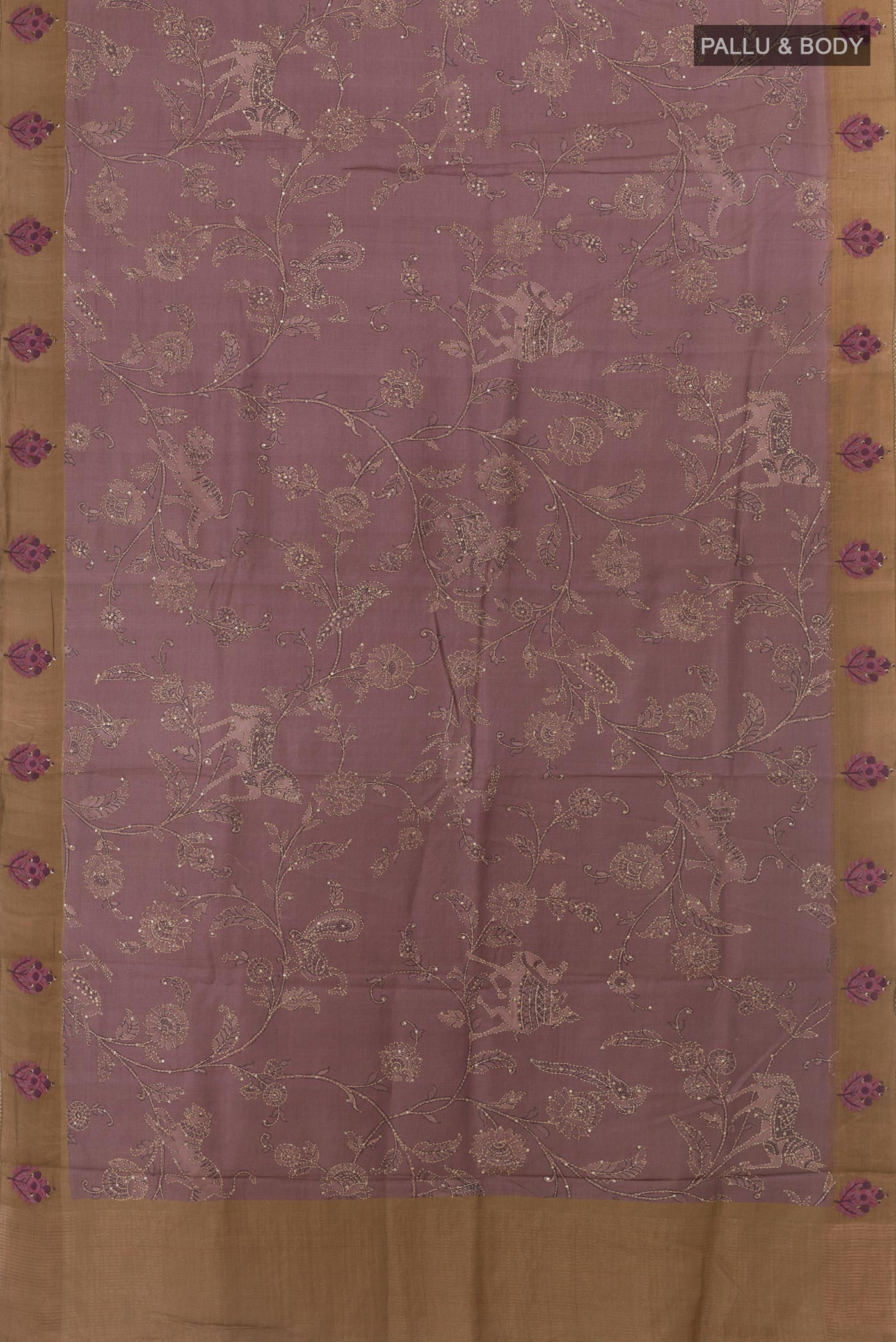 Flat view of Purple Tussar Silk Saree with Embroidery on the body and Zari Border. 