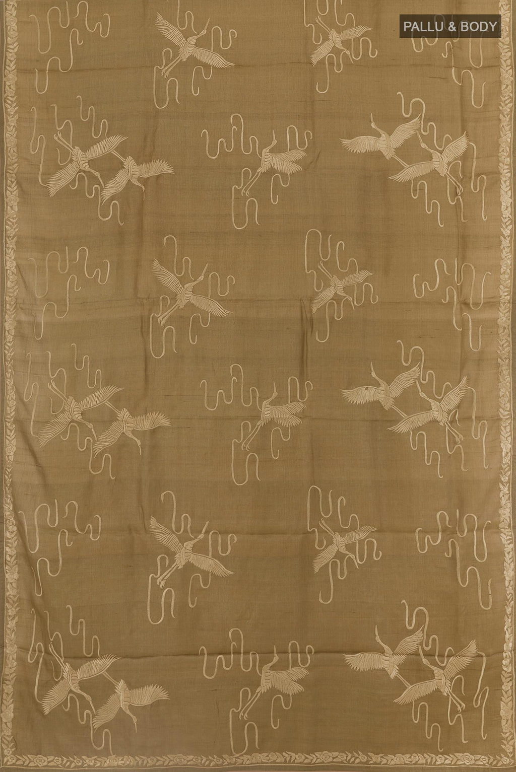 Flat view of Beige Tussar Silk Saree with Embroidery on the body and Embroidery Border. 