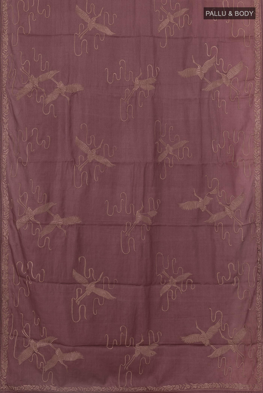 Flat view of Purple Tussar Silk Saree with Embroidery on the body and Embroidery Border. 