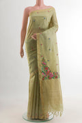 Beige Tussar Silk Saree with Embroidery on the body and Zari Border.  displayed on a mannequin