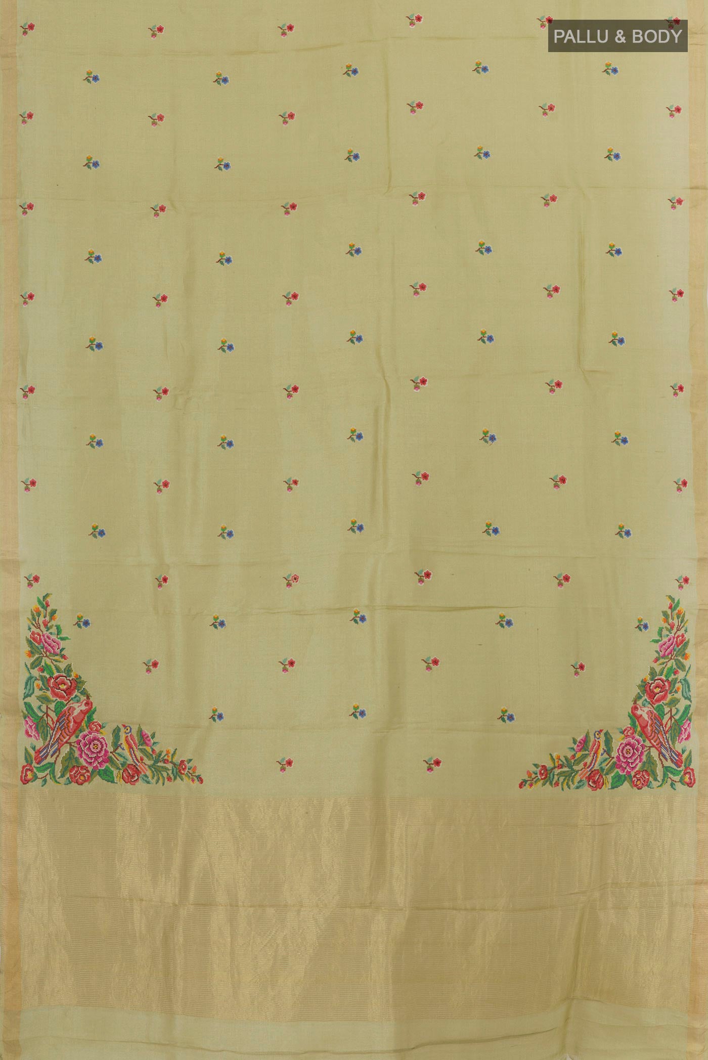 Flat view of Beige Tussar Silk Saree with Embroidery on the body and Zari Border. 