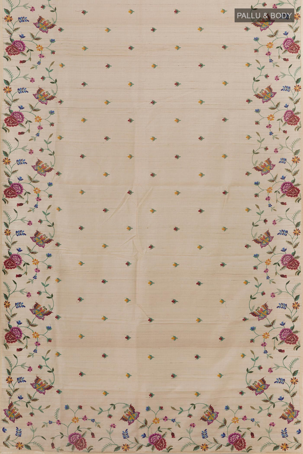 Flat view of Cream Tussar Saree with Embroidery on the body and Embroidery Border. 