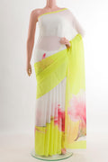 Yellow Chiffon Saree with Printed design on the body and Zari Border.  displayed on a mannequin