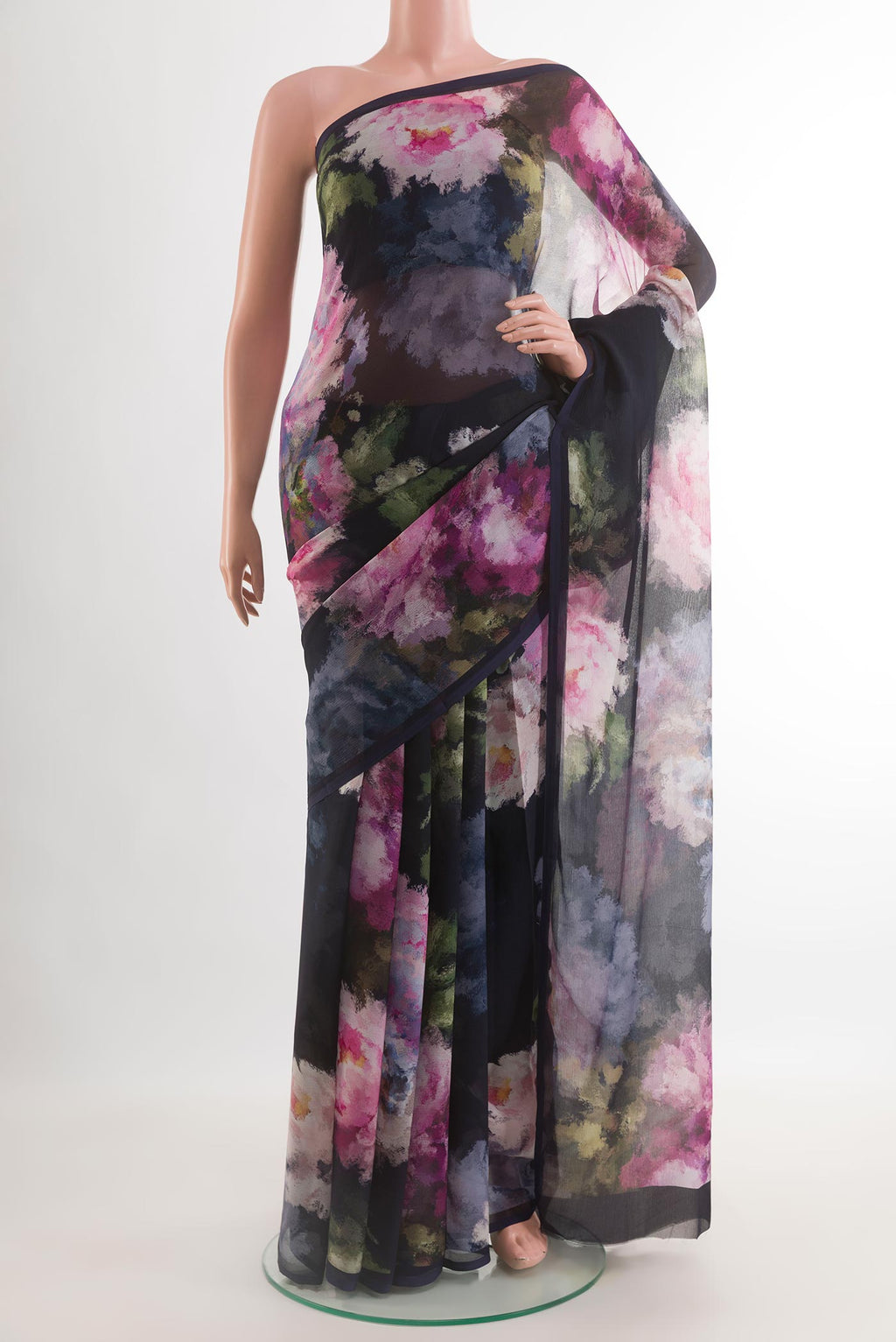 Dark Blue Chiffon Saree with Printed design on the body and Zari Border.  displayed on a mannequin