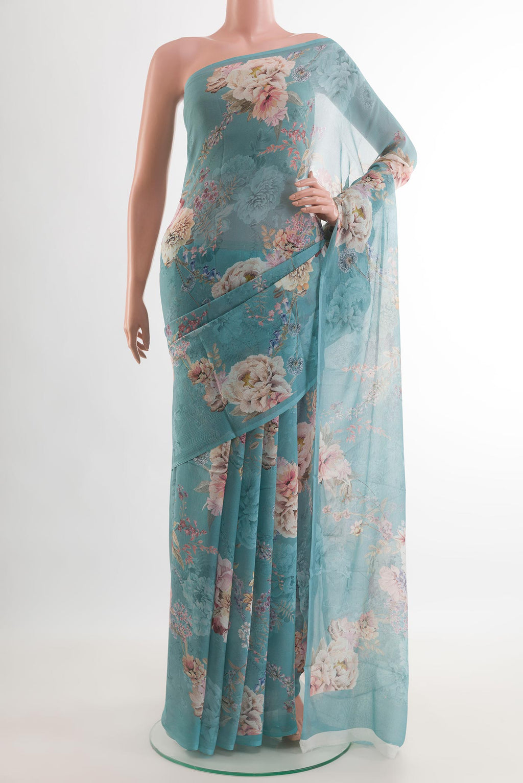 Blue Mysore Chiffon Saree with Floral Print on the body and Plain Border.  displayed on a mannequin