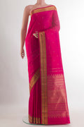 Pure Silk Pure Zari Pink Kanjivaram Saree with Zari Butta on the body and Zari Border.  displayed on a mannequin