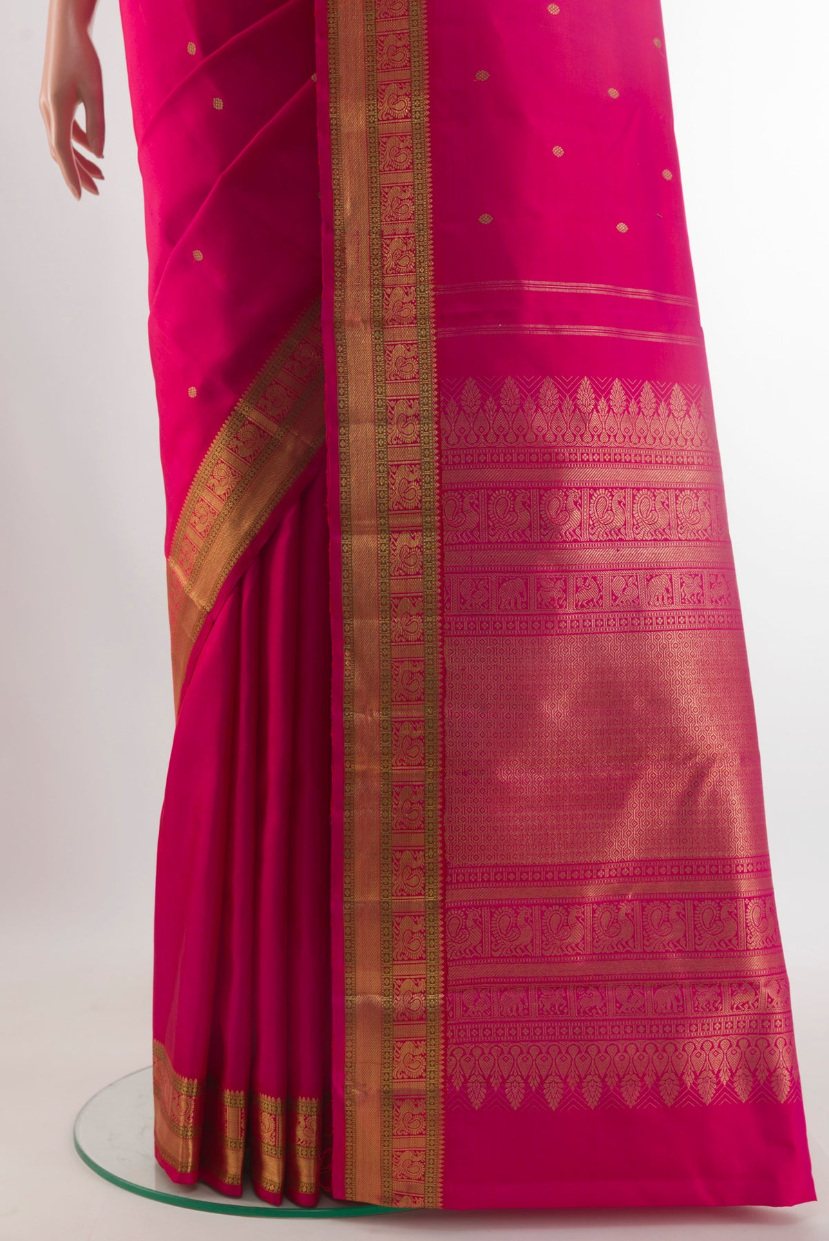 Pleats and pallu of Pure Silk Pure Zari Pink Kanjivaram Saree with Zari Butta on the body and Zari Border. 