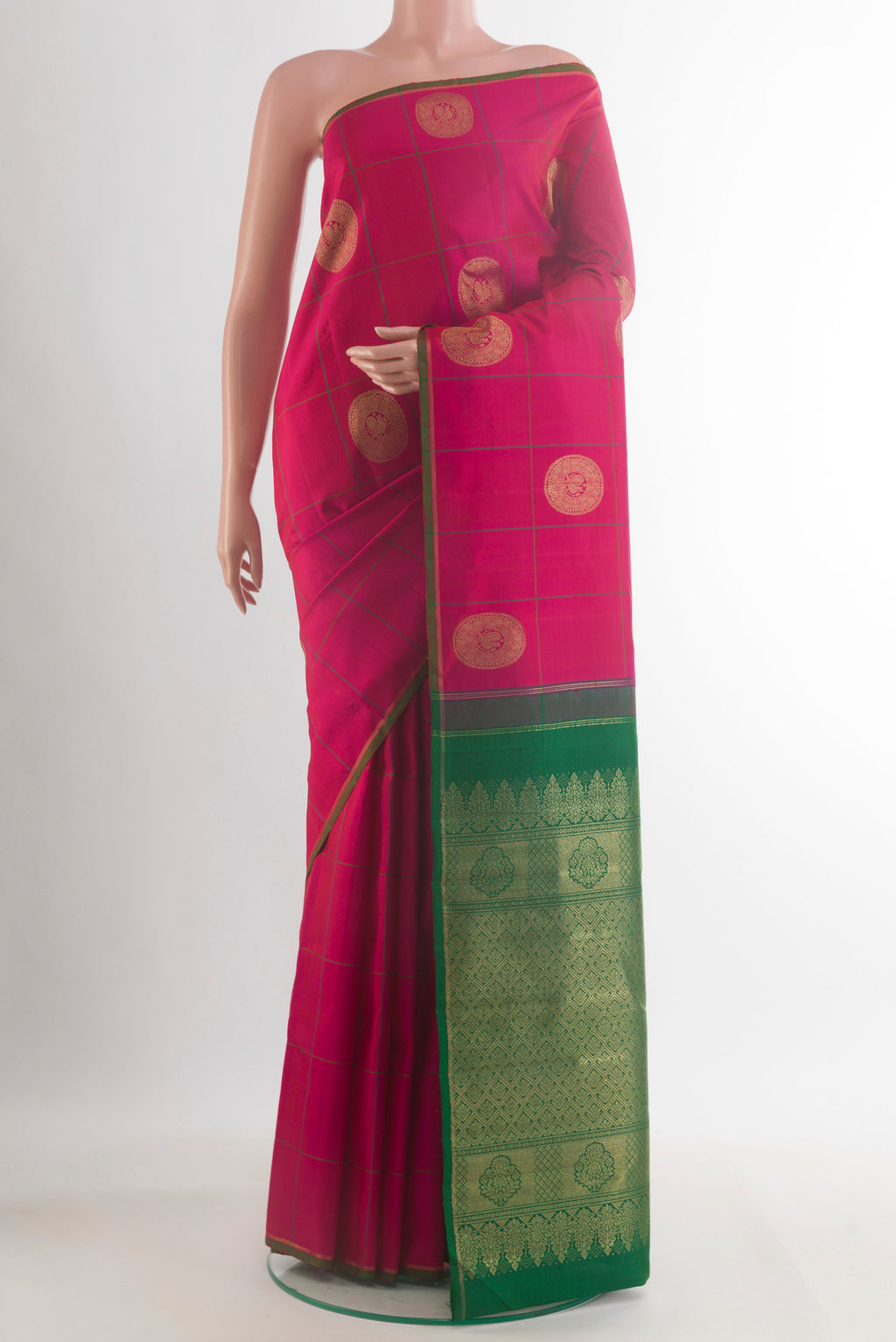 Pure Silk Pure Zari Pink Kanchipuram Saree with Checked design on the body and Zari Border.  displayed on a mannequin
