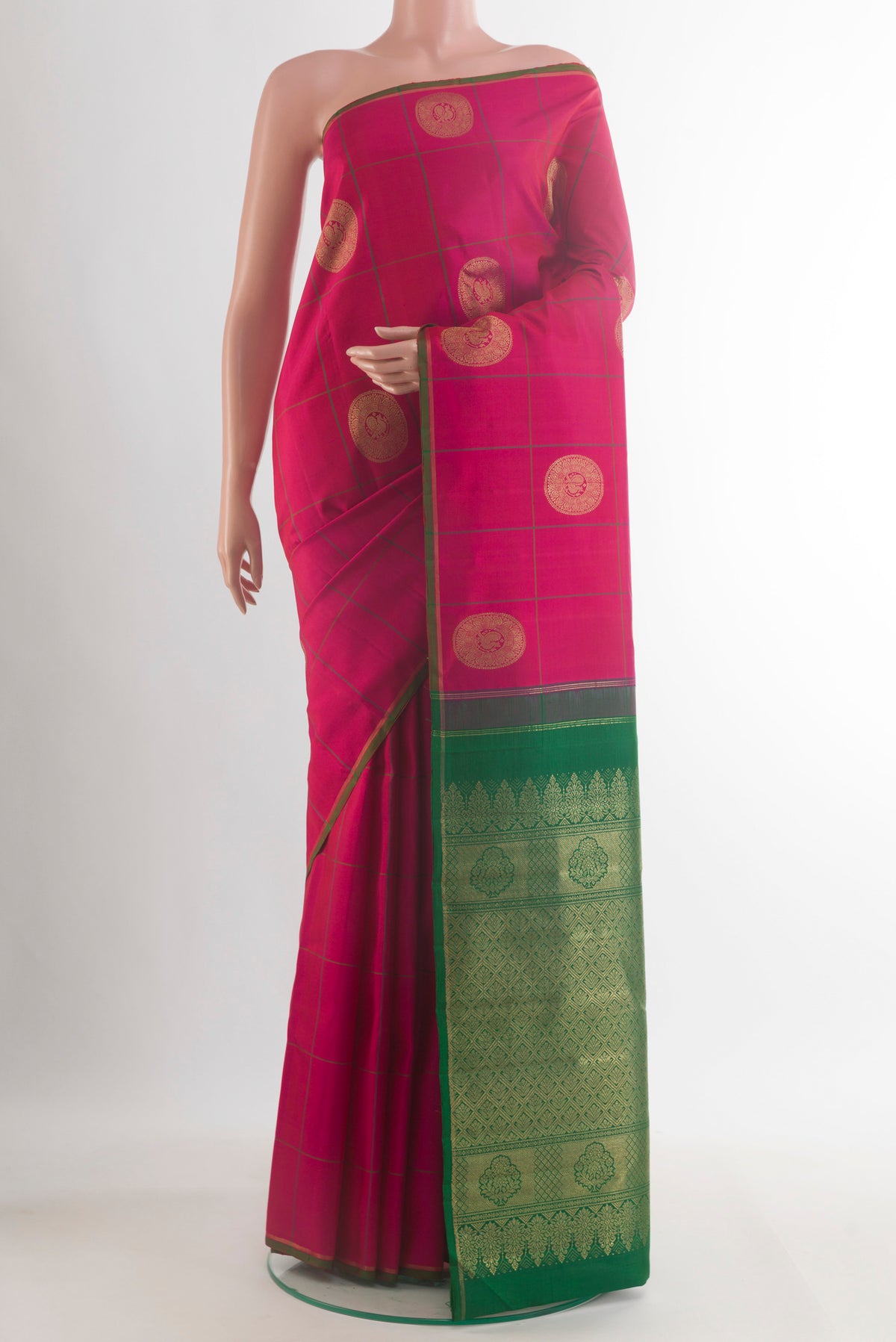 Pure Silk Pure Zari Pink Kanchipuram Saree with Checked design on the body and Zari Border.  displayed on a mannequin