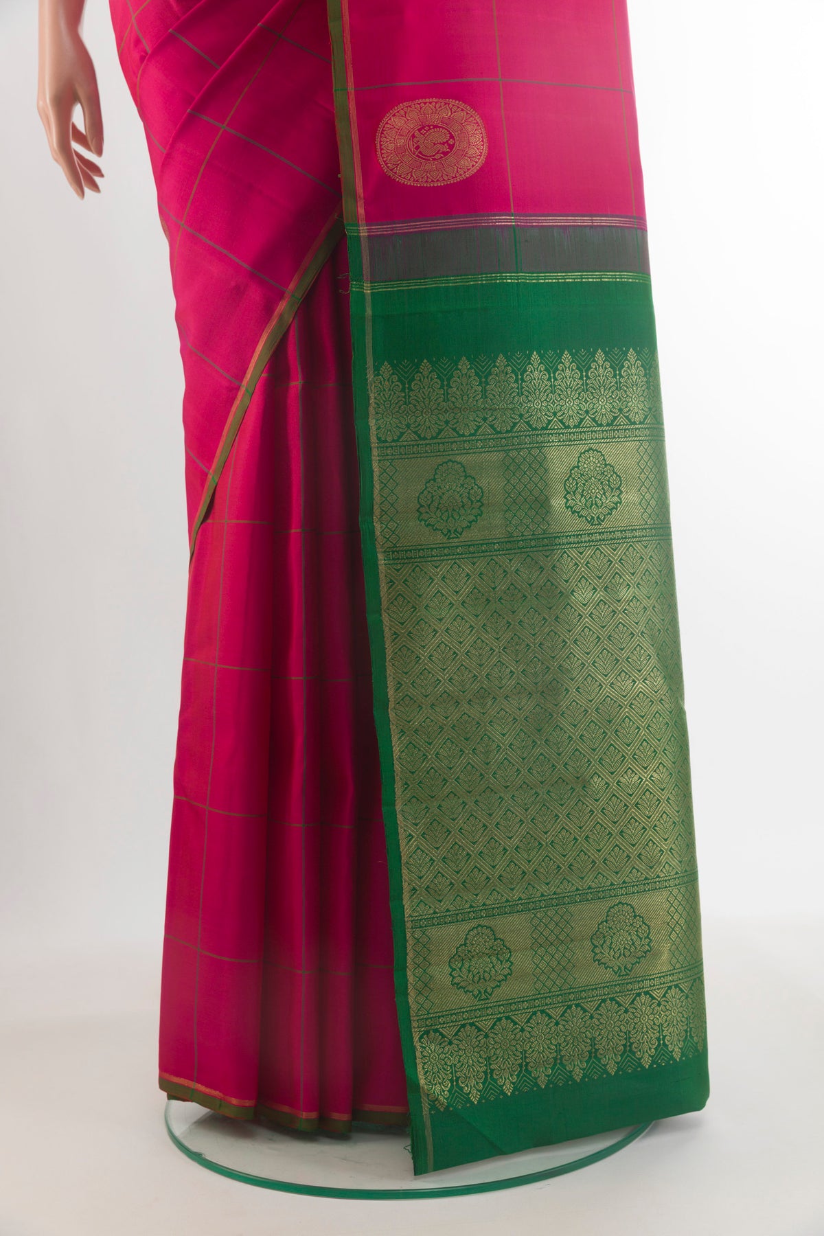 Pleats and pallu of Pure Silk Pure Zari Pink Kanchipuram Saree with Checked design on the body and Zari Border. 