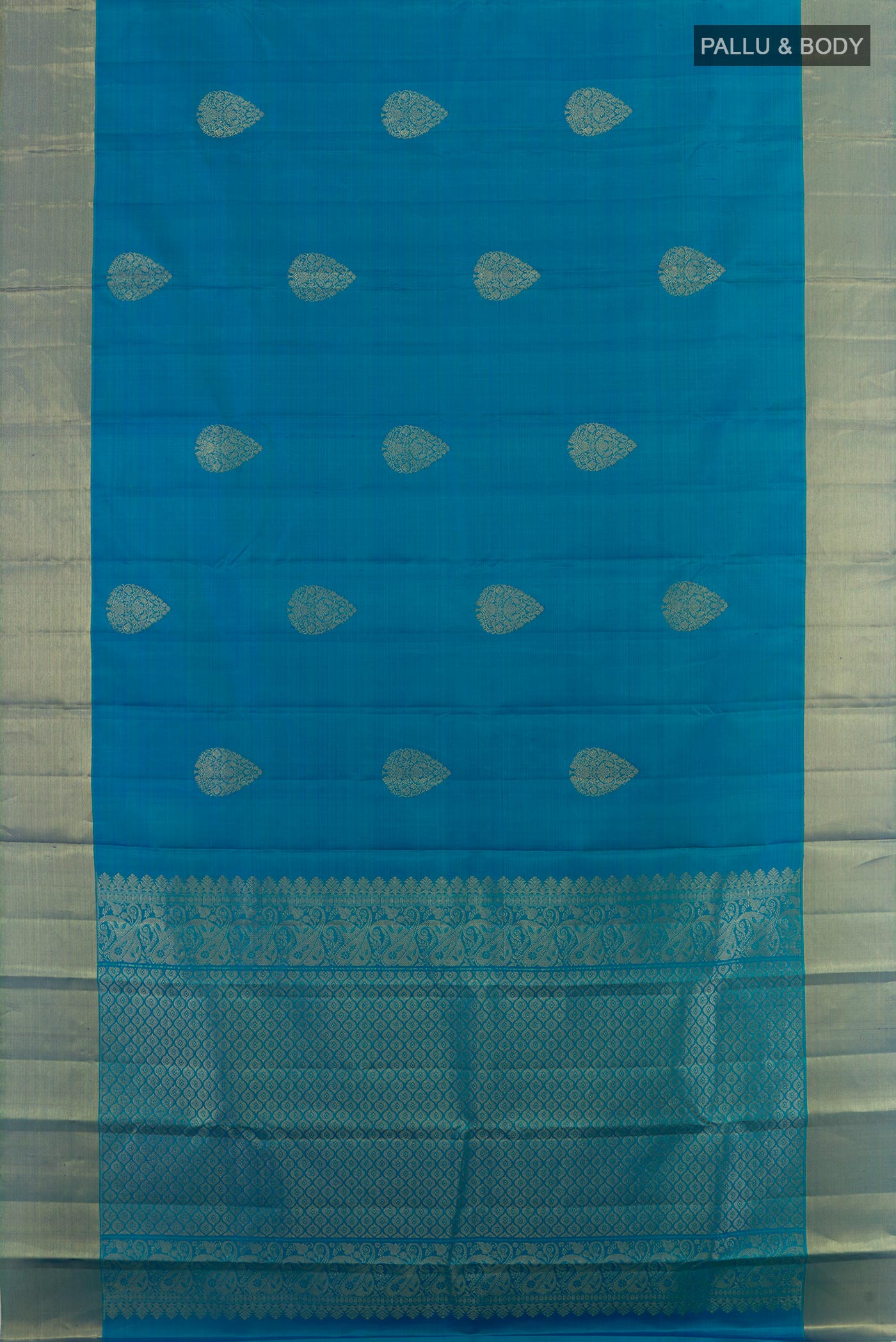 Flat view of Blue Kanchipuram Silk Saree with Zari Butta on the body and Zari Border. 