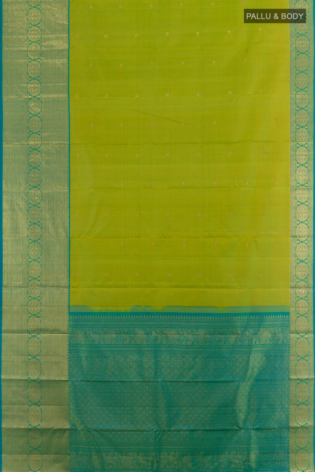 Flat view of Green Kanchipuram Silk Saree with Zari Butta on the body and Zari Border. 