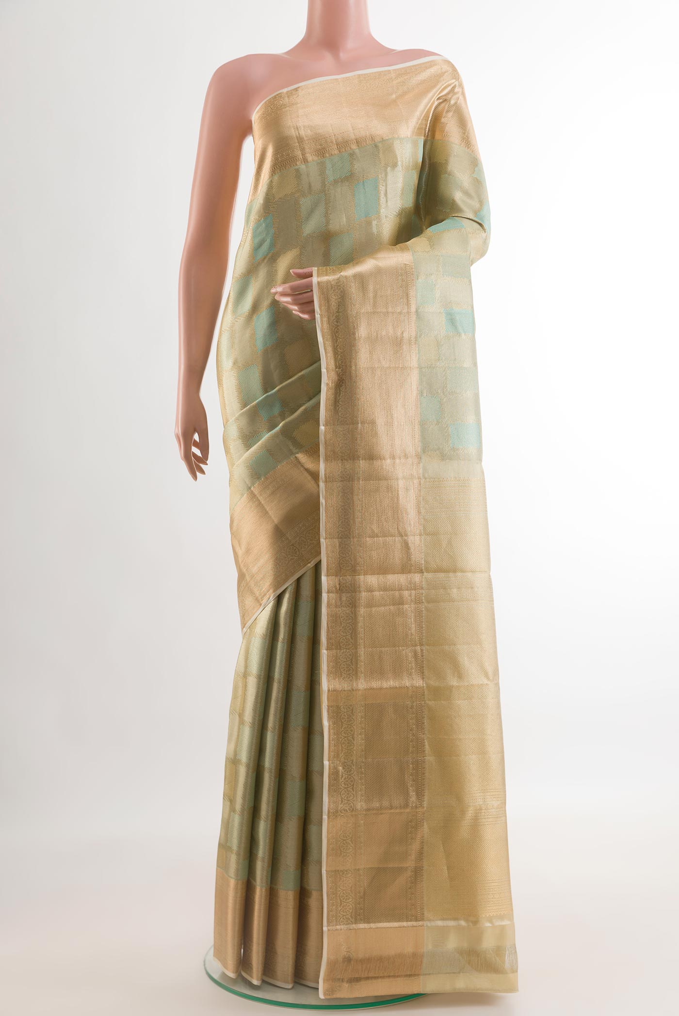 Blue Kanjivaram Silk Saree with Zari Brocade on the body and Zari Border.  displayed on a mannequin