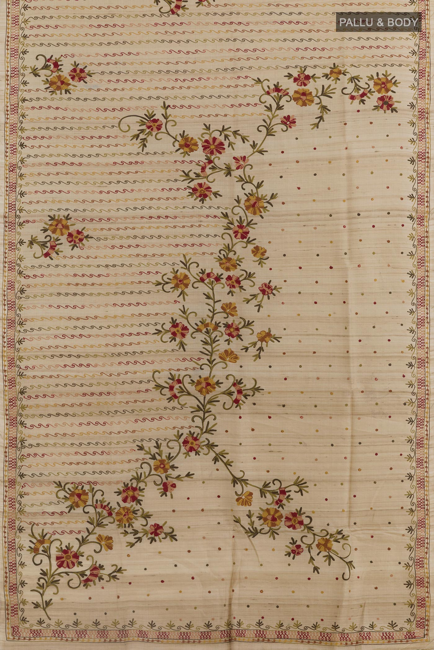 Flat view of Beige Tussar Silk Saree with Embroidery on the body and Embroidery Border. 