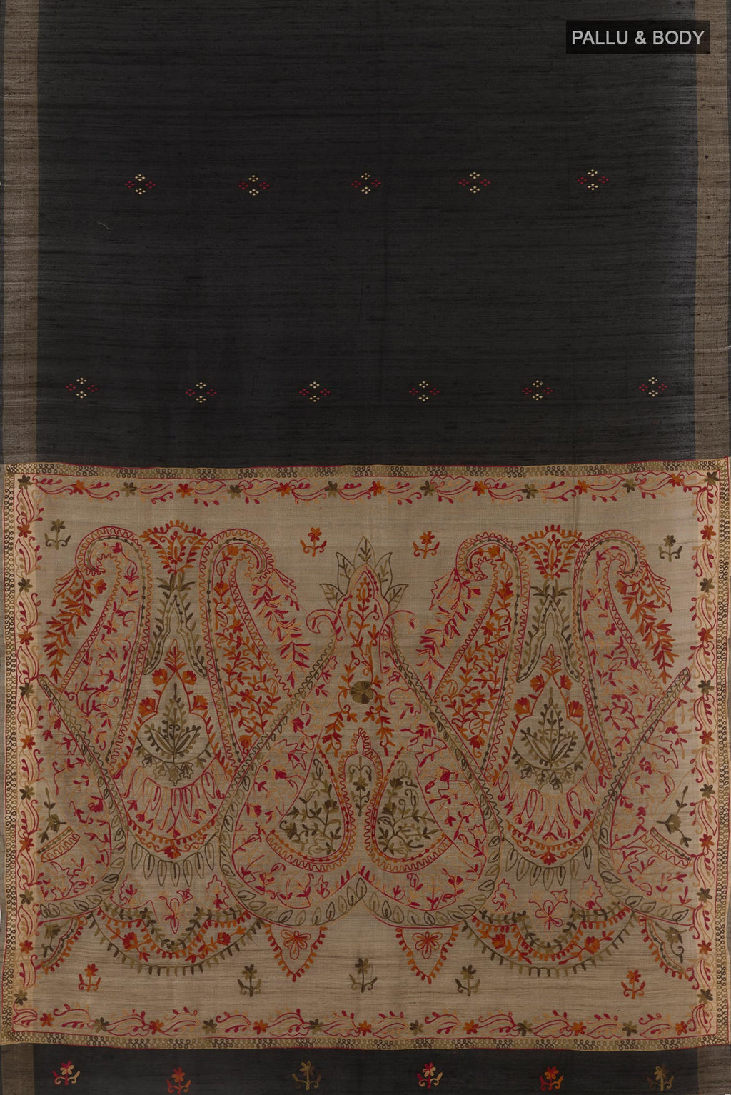 Flat view of Black Tussar Silk Saree with Thread Butta on the body and Zari Border. 