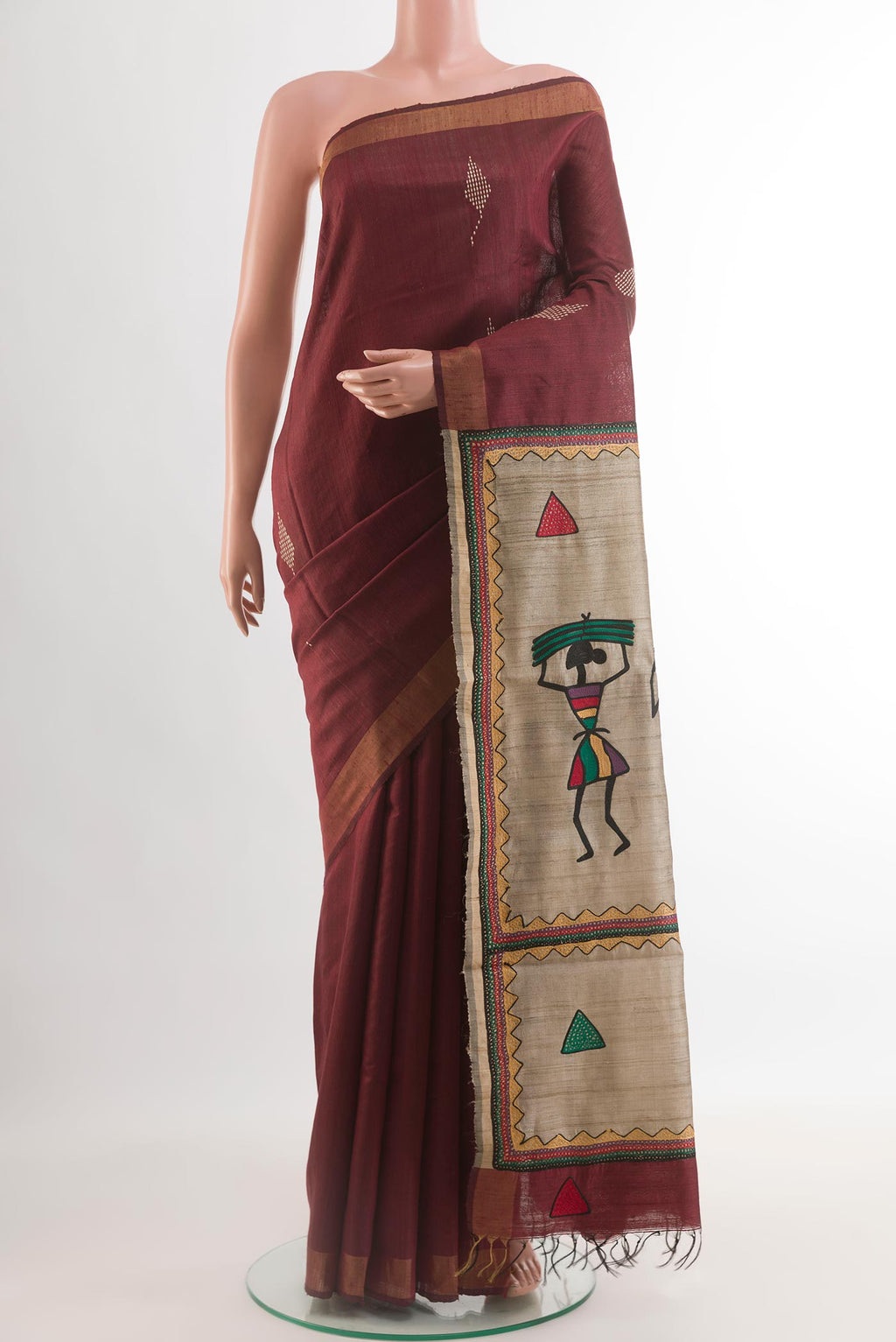 Brown Tussar Silk Saree with Thread Butta on the body and Zari Border.  displayed on a mannequin