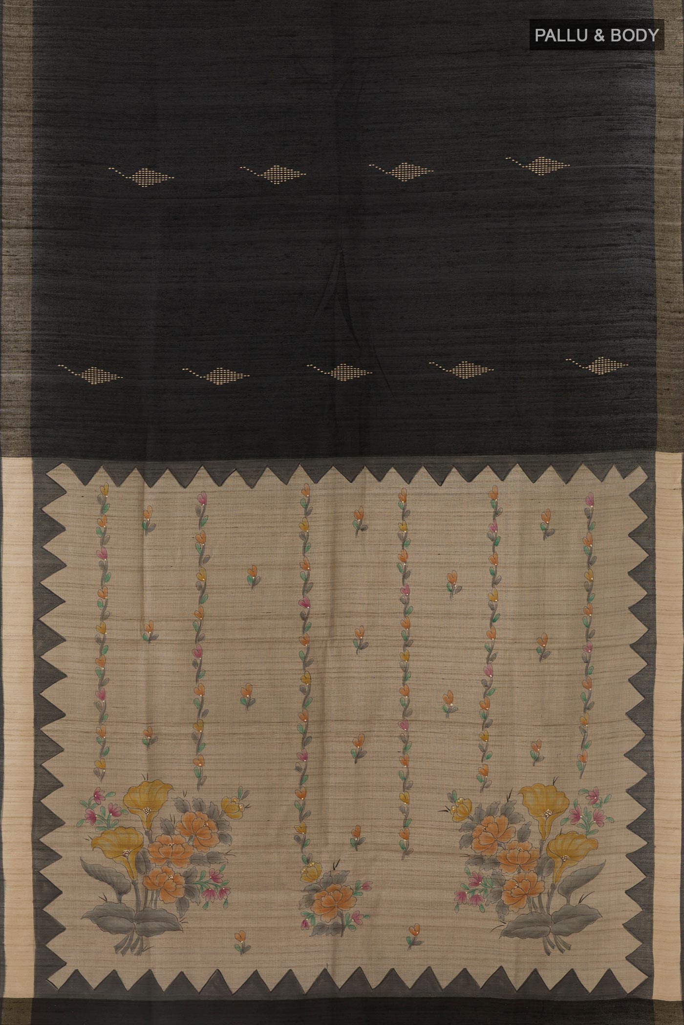 Flat view of Black Tussar Silk Saree with Thread Butta on the body and Zari Border. 