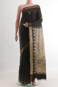 Black Tussar Silk Saree with Thread Butta on the body and Zari Border.  displayed on a mannequin