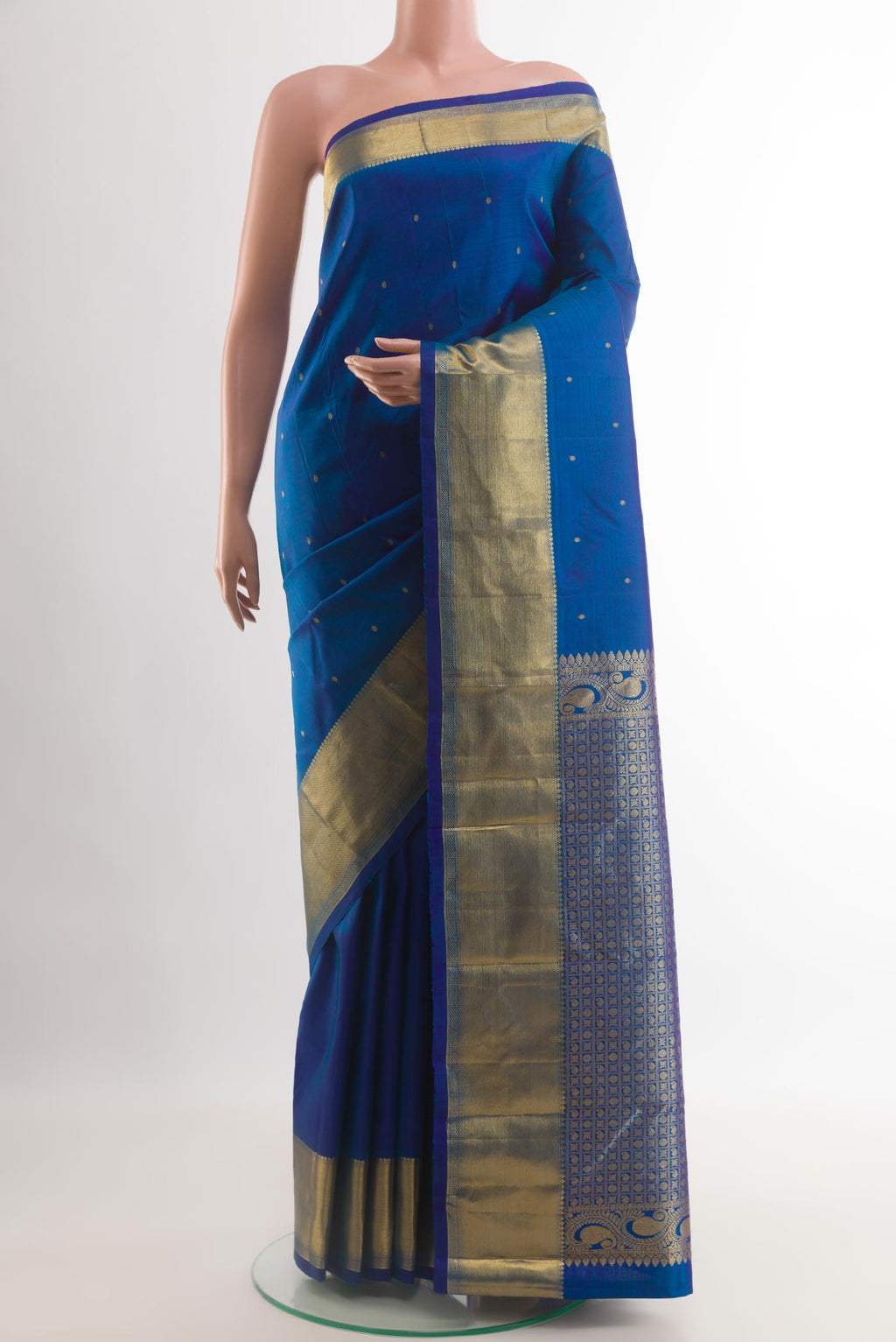 Blue Kanchipuram Silk Saree with Zari Butta on the body and Zari Border.  displayed on a mannequin