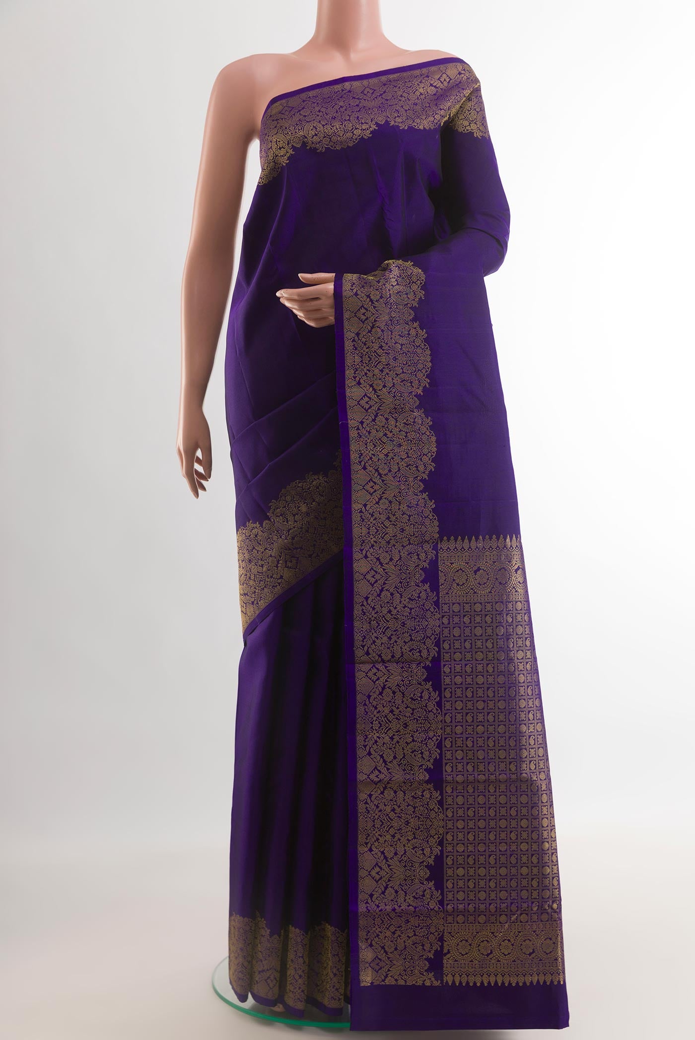 Blue Kanchipuram Silk Saree with Plain Body and Fancy Border.  displayed on a mannequin