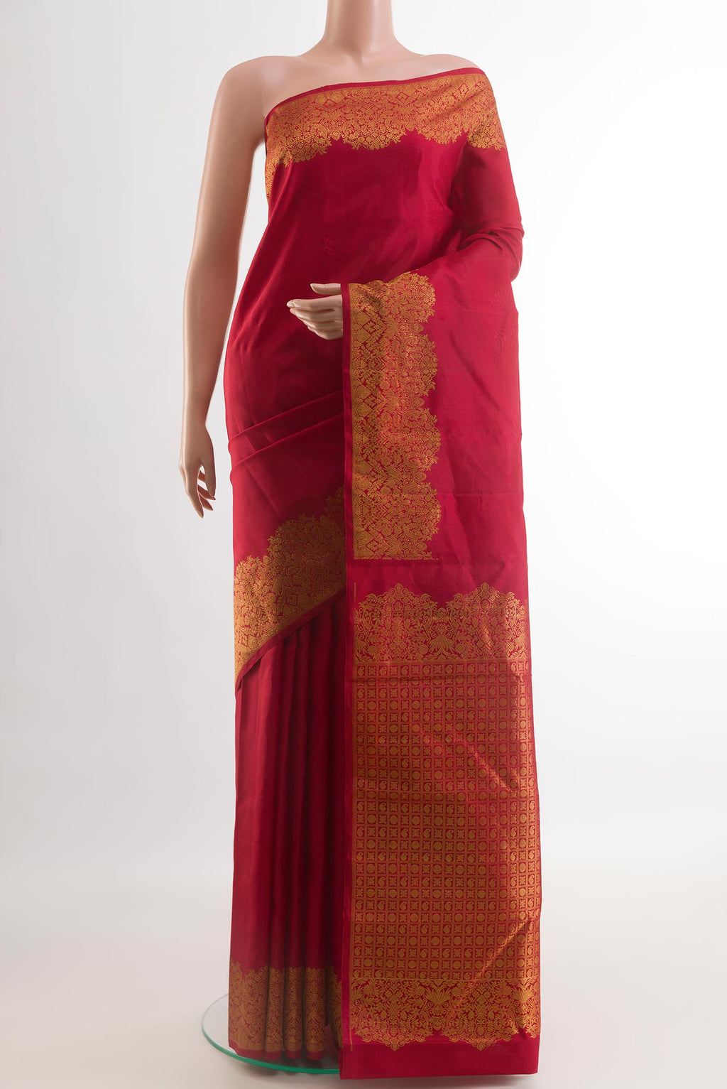 Red Kanchipuram Silk Saree with Plain Body and Zari Border.  displayed on a mannequin
