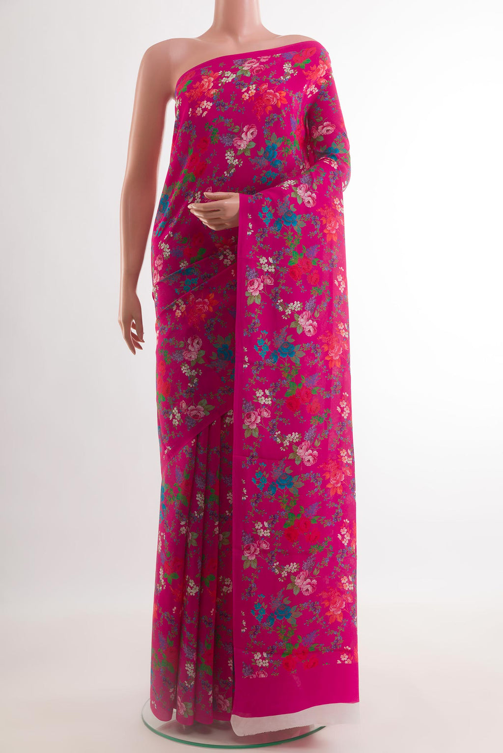 Pink Crepe Saree with Printed design on the body and Plain Border.  displayed on a mannequin