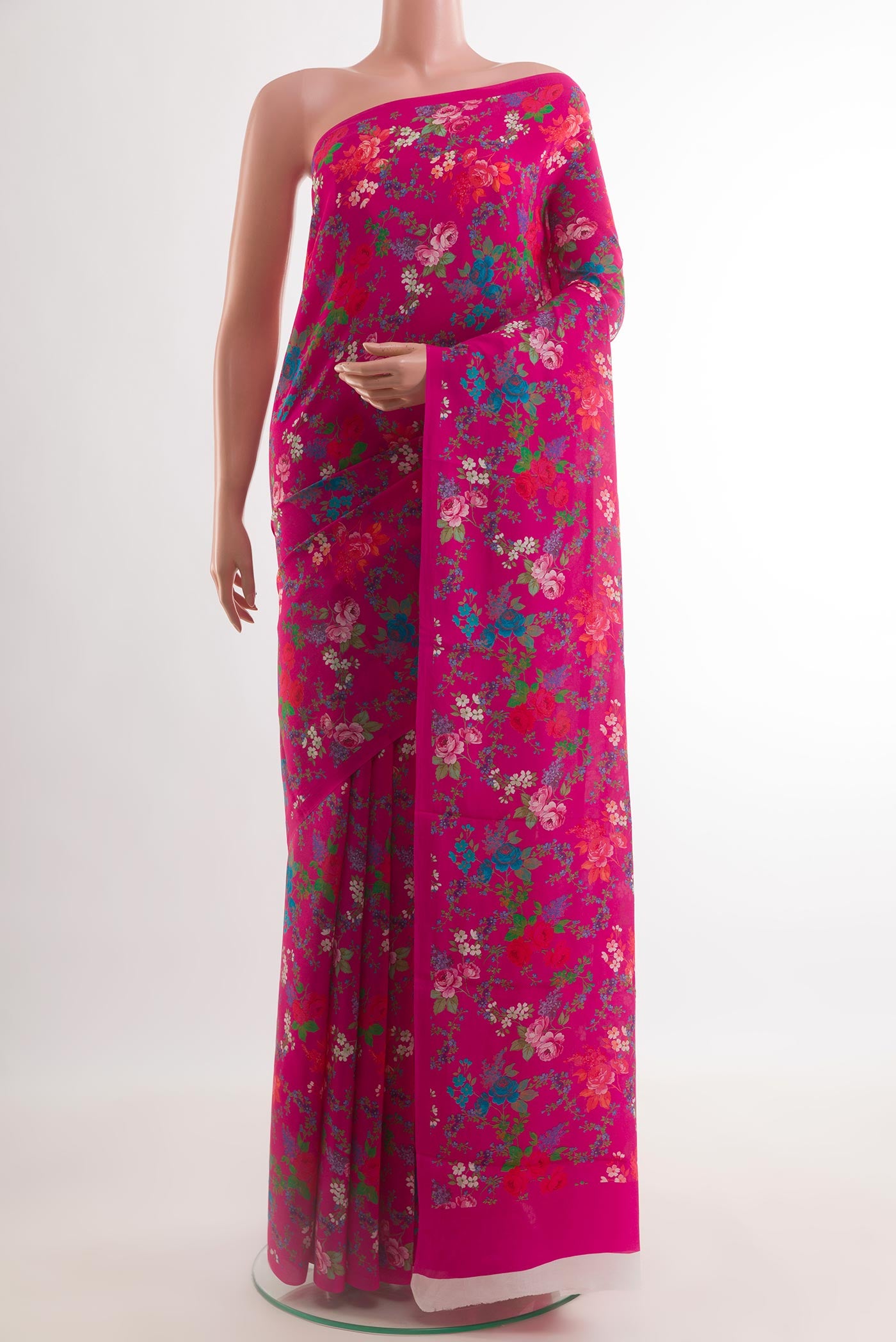 Pink Crepe Saree with Printed design on the body and Plain Border.  displayed on a mannequin