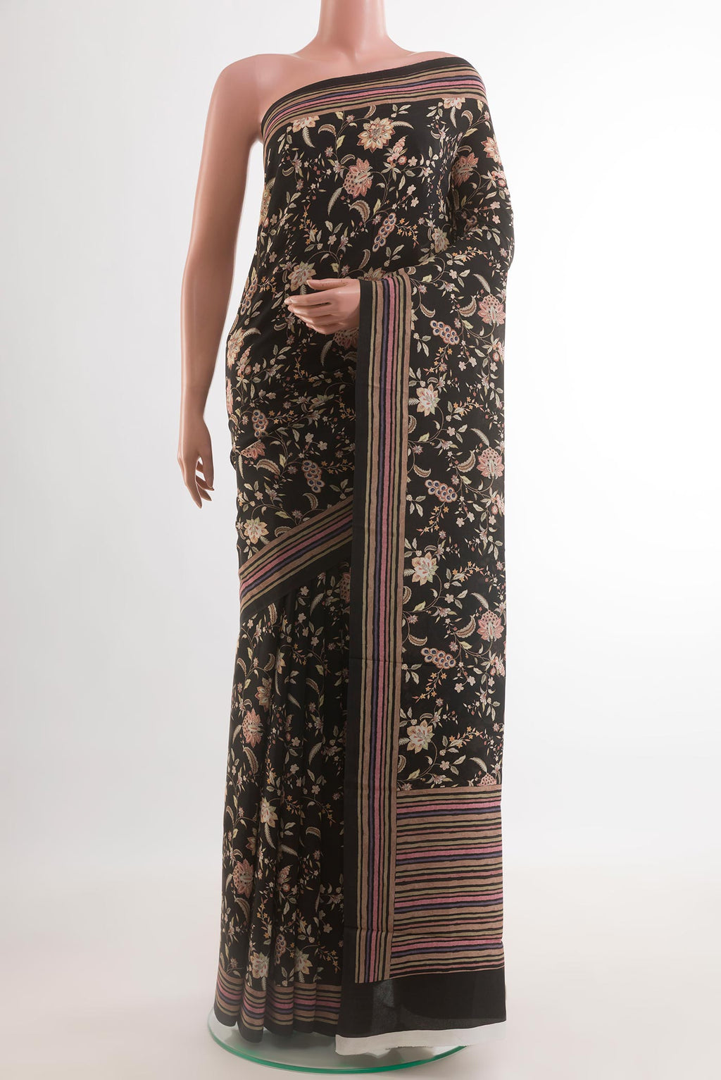 Black Crepe Saree with Printed design on the body and Plain Border.  displayed on a mannequin