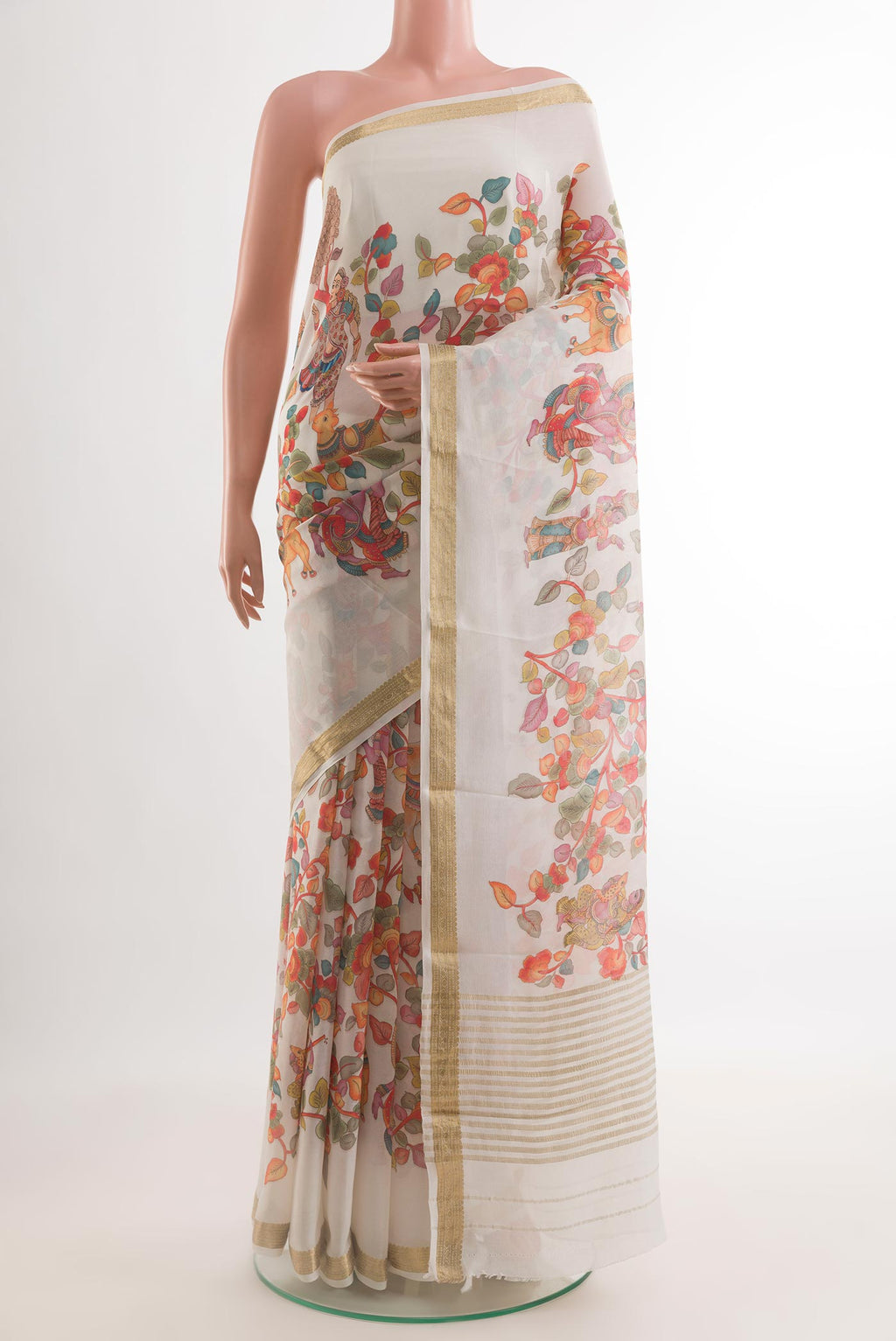 Off White Crepe Saree with Printed design on the body and Zari Border.  displayed on a mannequin