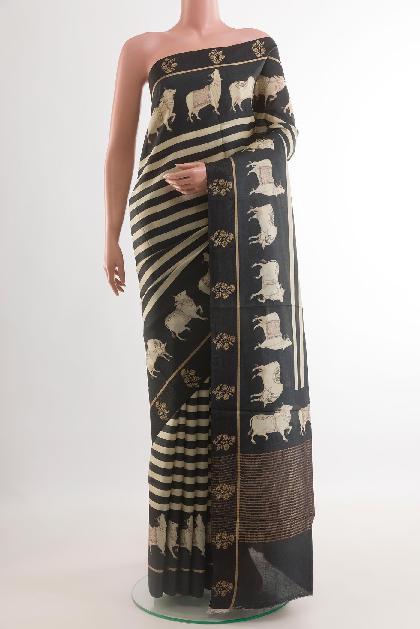 Multi Color Tussar Silk Saree with Stripes on the body and Printed Border.  displayed on a mannequin