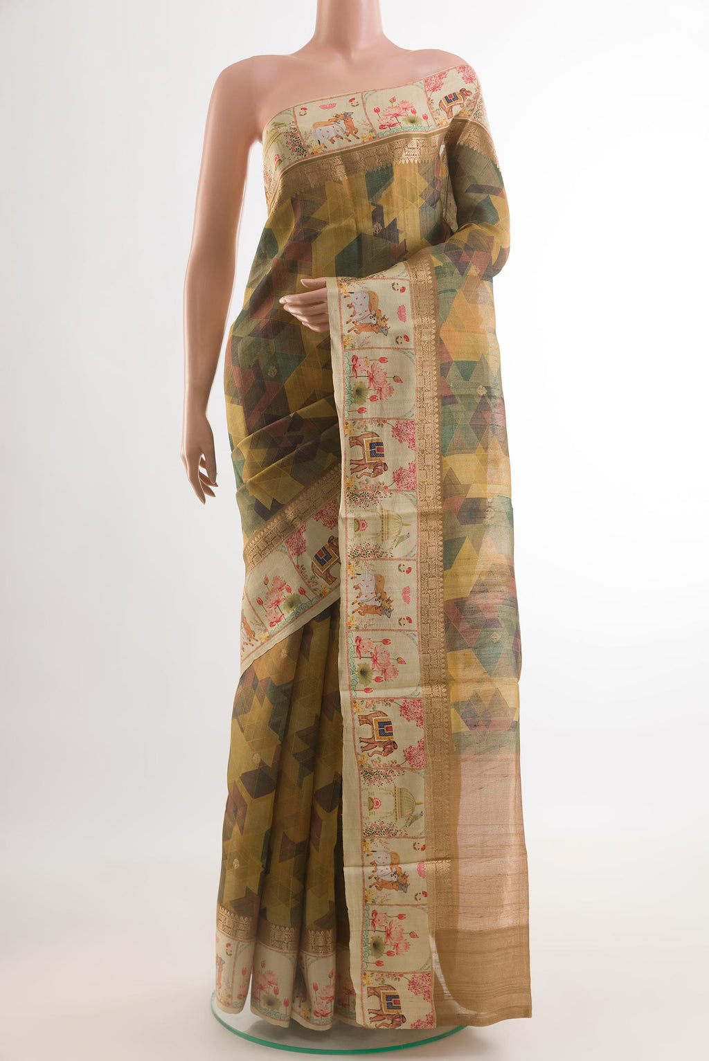 Multi Color Tussar Silk Saree with Printed design on the body and Printed Border.  displayed on a mannequin