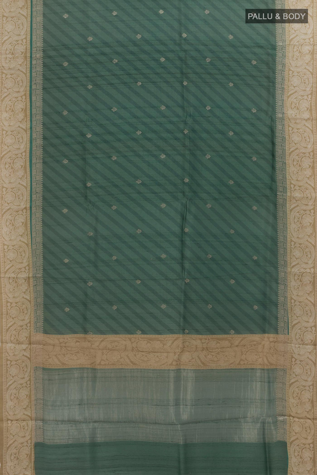 Flat view of Green Tussar Saree with Zari Butta on the body and Zari Border. 