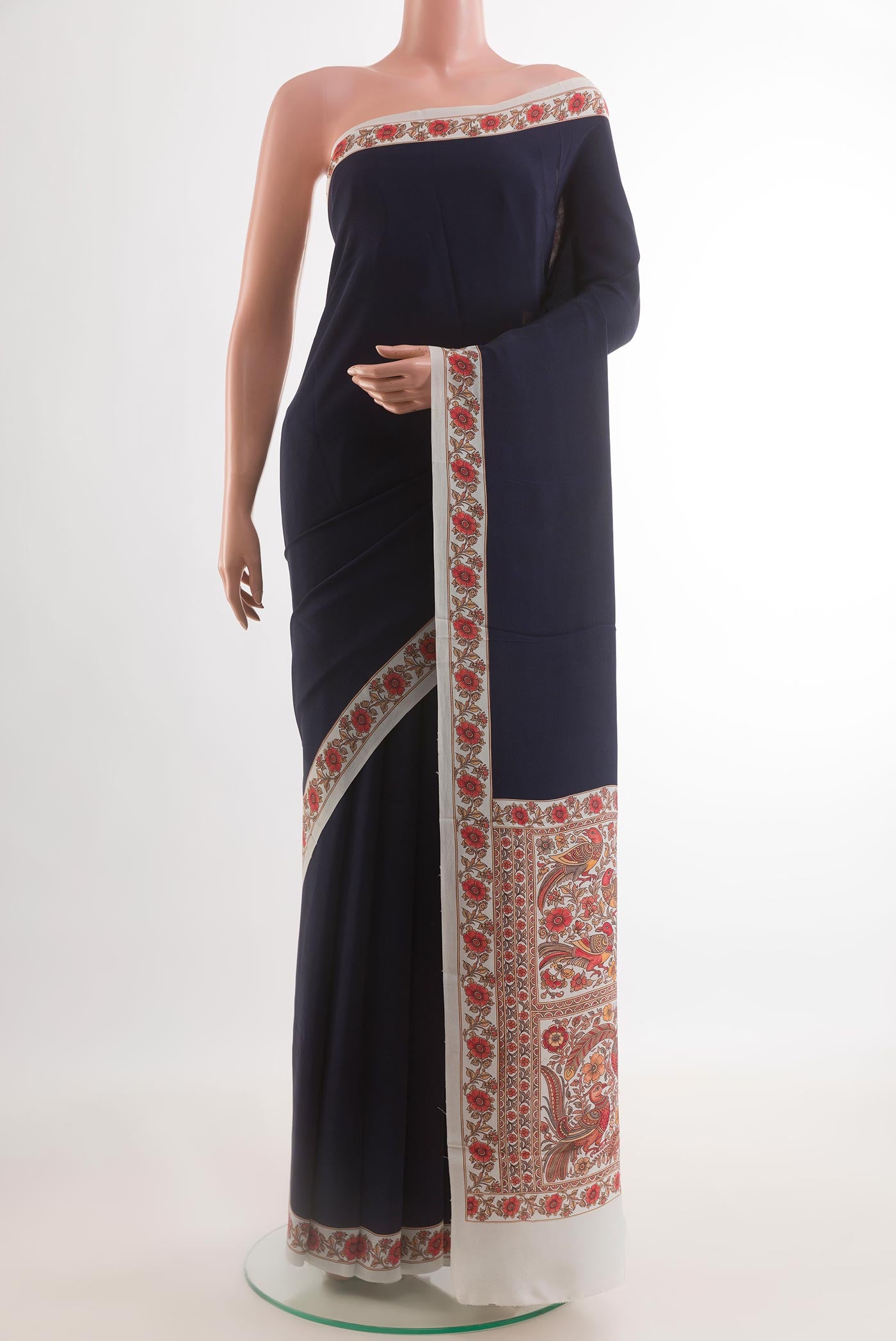 Navy Blue Crepe Saree with Plain Body and Printed Border.  displayed on a mannequin