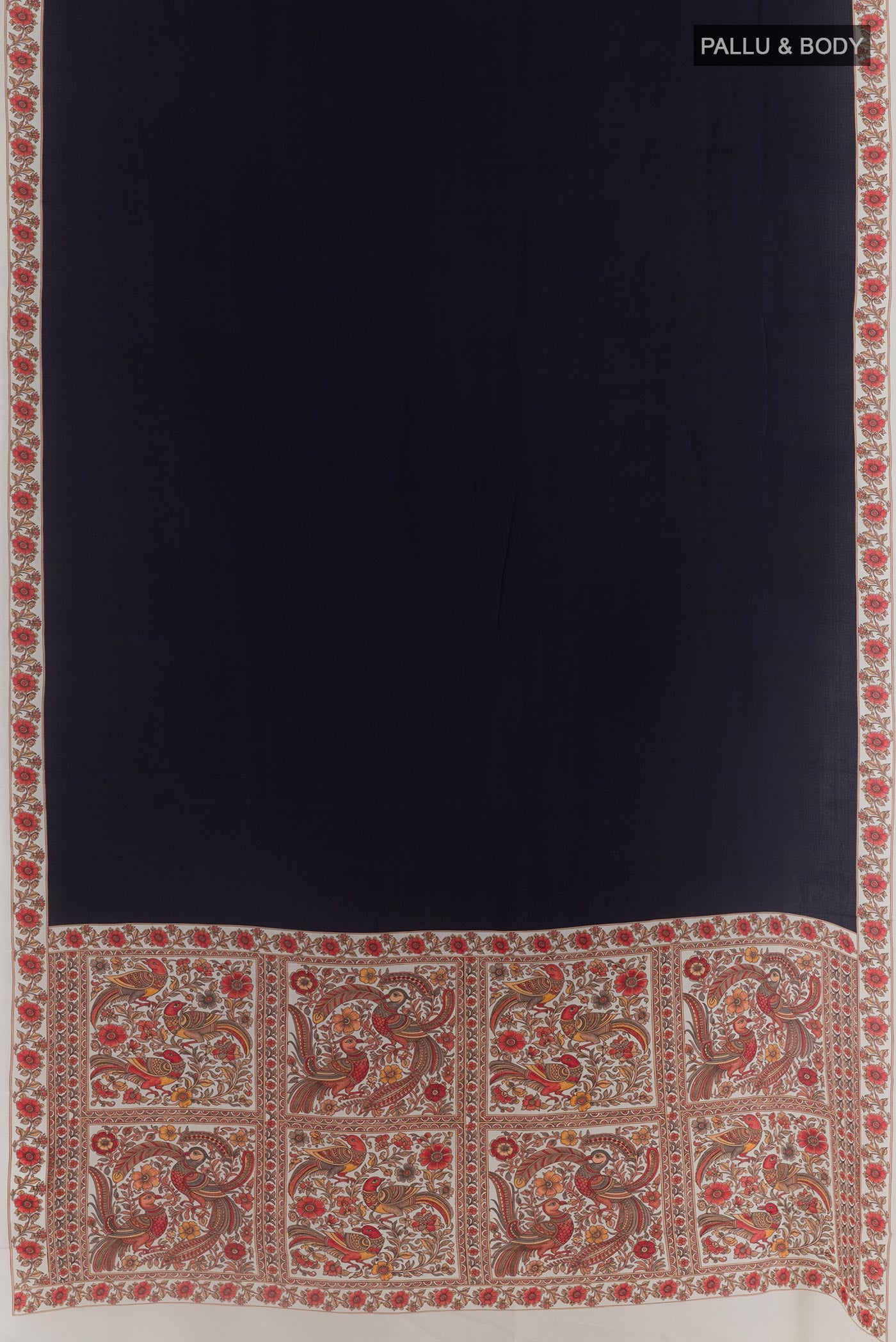 Flat view of Navy Blue Crepe Saree with Plain Body and Printed Border. 