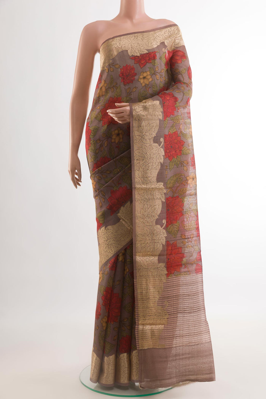 Lavender Tussar Saree with Printed design on the body and Zari Border.  displayed on a mannequin