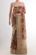 Beige Tussar Saree with Printed design on the body and Zari Border.  displayed on a mannequin