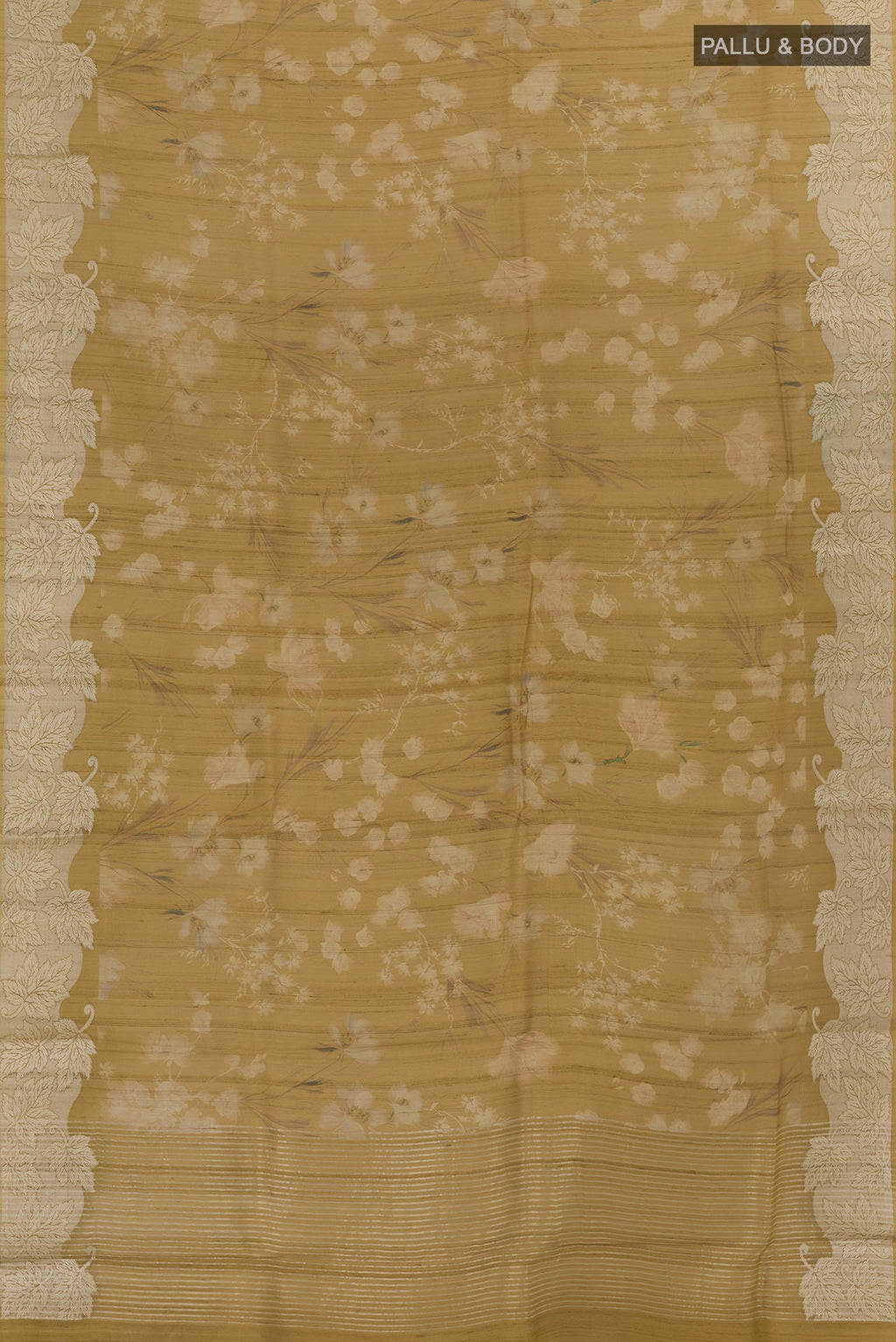 Flat view of Mustard Tussar Saree with Printed design on the body and Zari Border. 