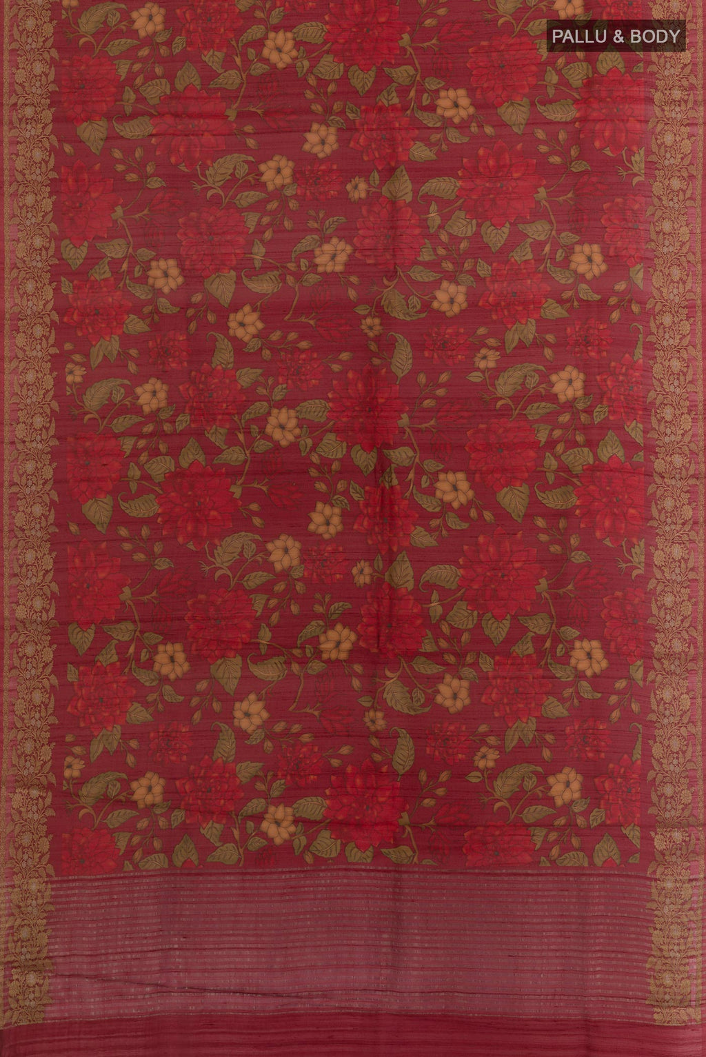 Flat view of Maroon Tussar Silk Saree with Printed design on the body and Zari Border. 