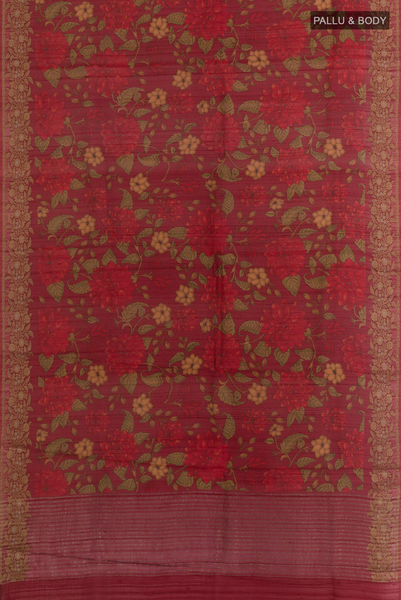 Flat view of Maroon Tussar Silk Saree with Printed design on the body and Zari Border. 