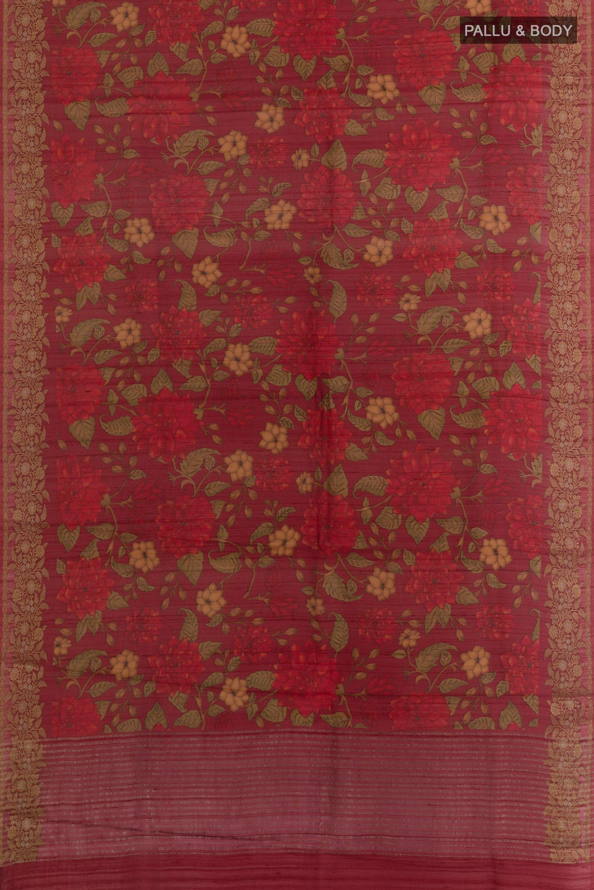 Flat view of Maroon Tussar Silk Saree with Printed design on the body and Zari Border. 