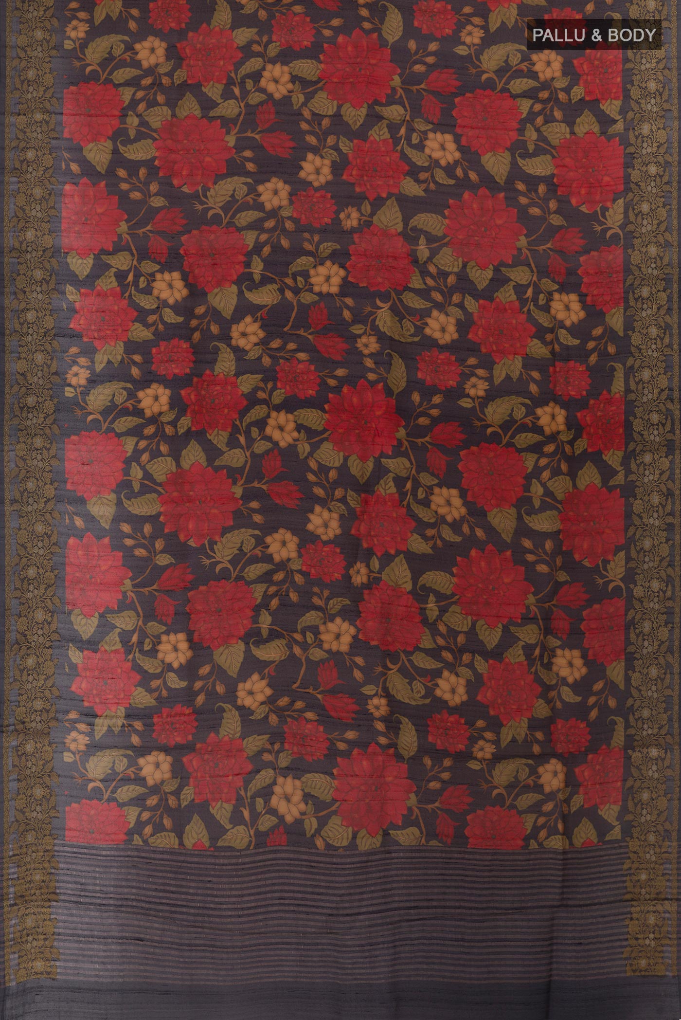 Flat view of Navy Blue Tussar Silk Saree with Printed design on the body and Zari Border. 