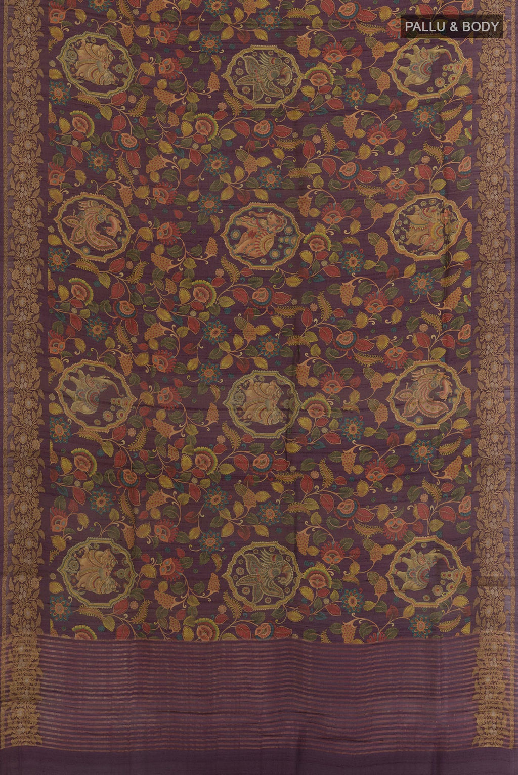 Flat view of Purple Tussar Silk Saree with kalamkari Print on the body and Zari Border. 