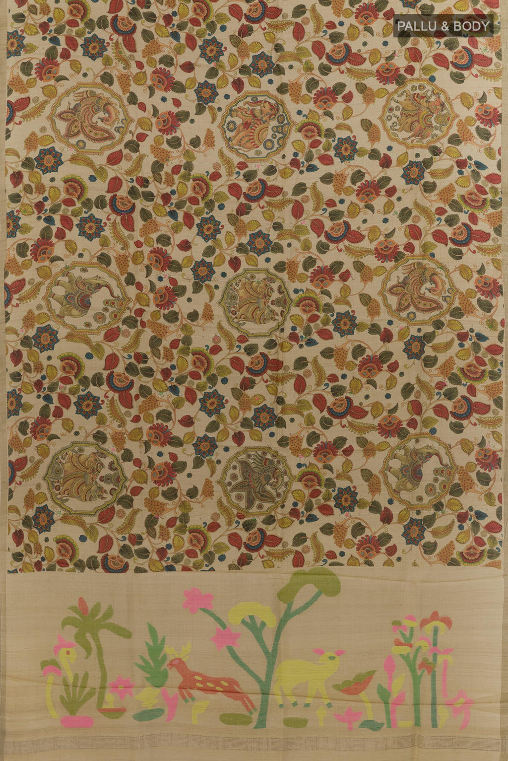 Flat view of Cream Tussar Silk Saree with Printed design on the body and Zari Border. 