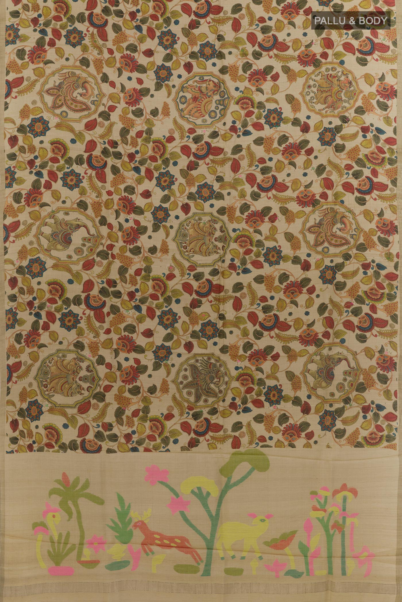 Flat view of Cream Tussar Silk Saree with Printed design on the body and Zari Border. 