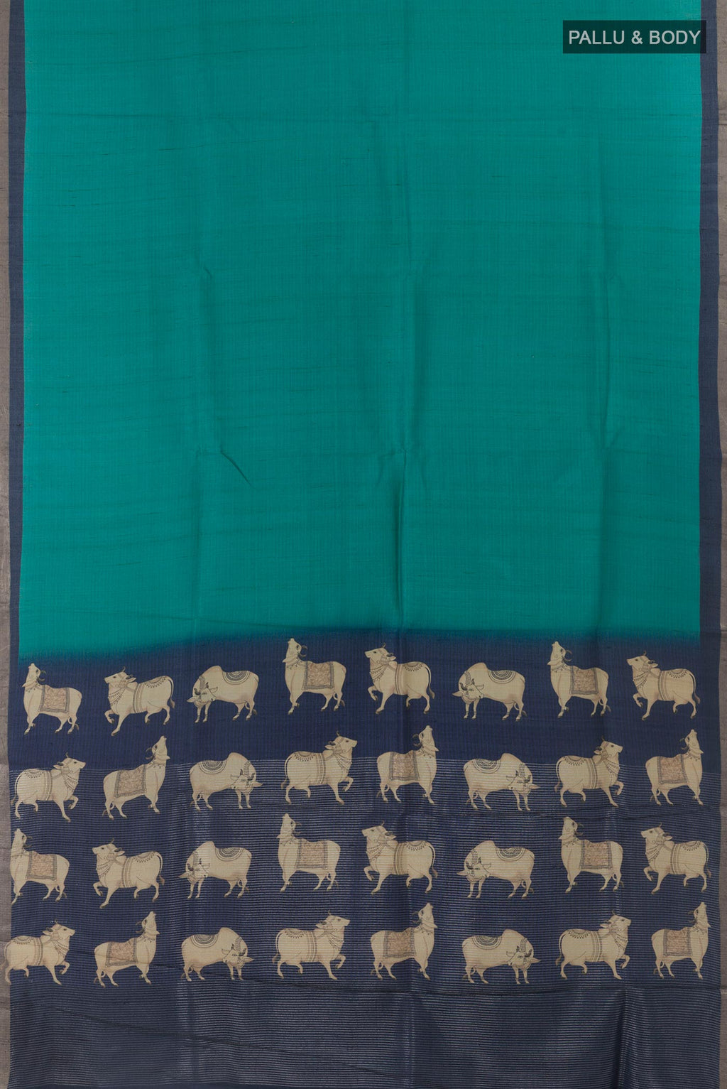 Flat view of Turquoise Tussar Silk Saree with Plain Body and Printed Border. 
