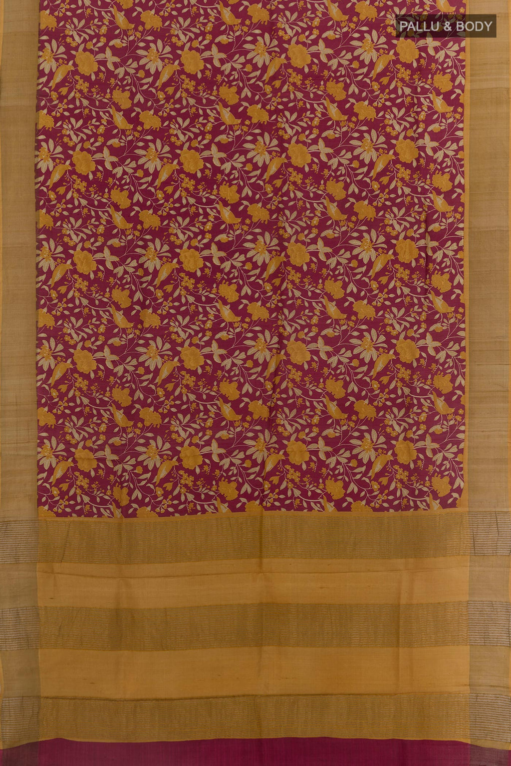 Flat view of Maroon Tussar Silk Saree with Printed design on the body and Zari Border. 