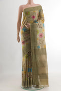 Beige Tussar Silk Saree with Printed design on the body and Zari Border.  displayed on a mannequin